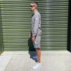 Modern men's grey streetwear tracksuit by Gabos London, complete with zip-up jacket and cargo-style shorts for effortless warm-weather looks