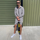 Contemporary grey matching tracksuit set with lightweight shorts – a Gabos London essential for elevated everyday urban wear.