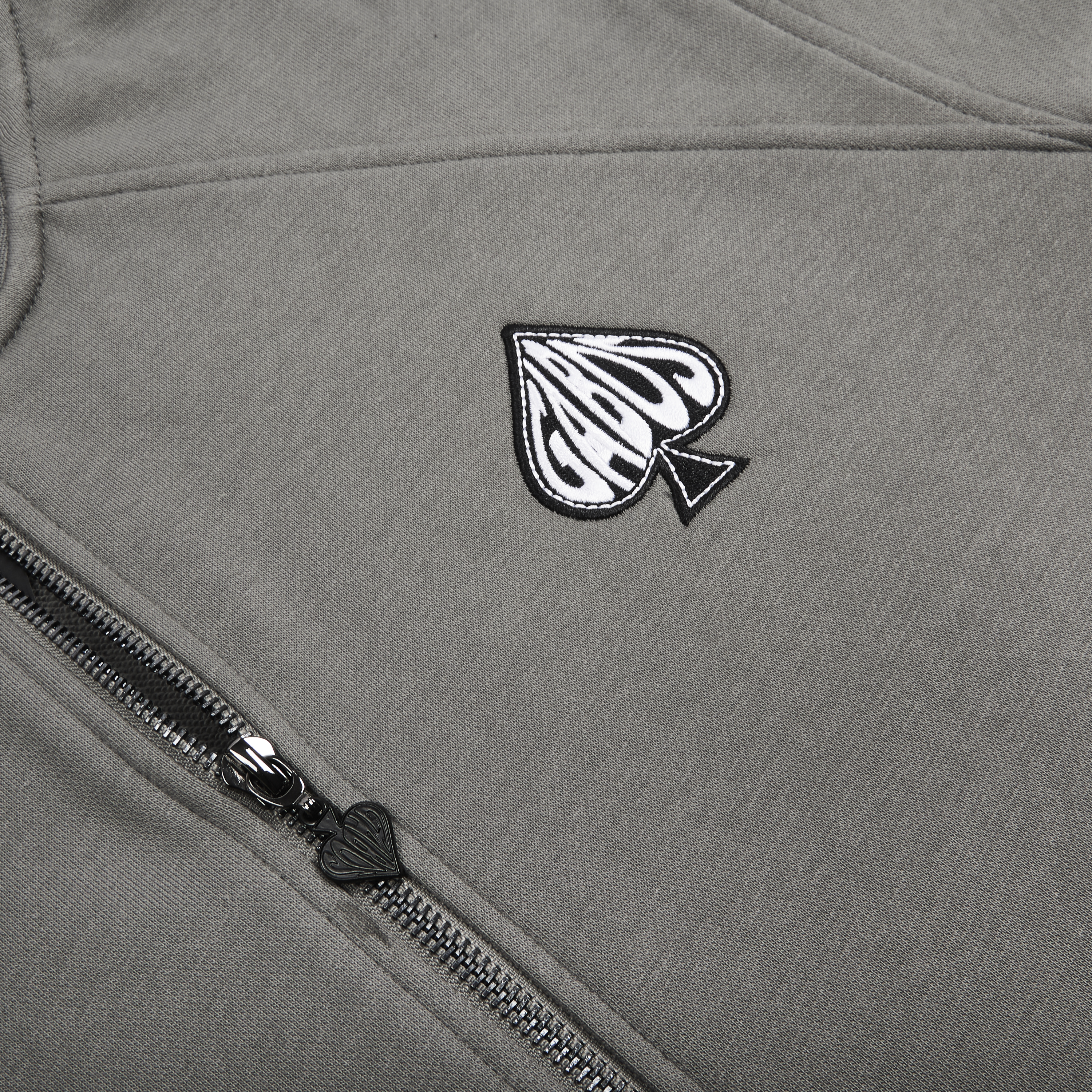 Custom Zip puller with Embroidery for This Grey Matching Tracksuit set by Gabos London. This is the Money Mitch