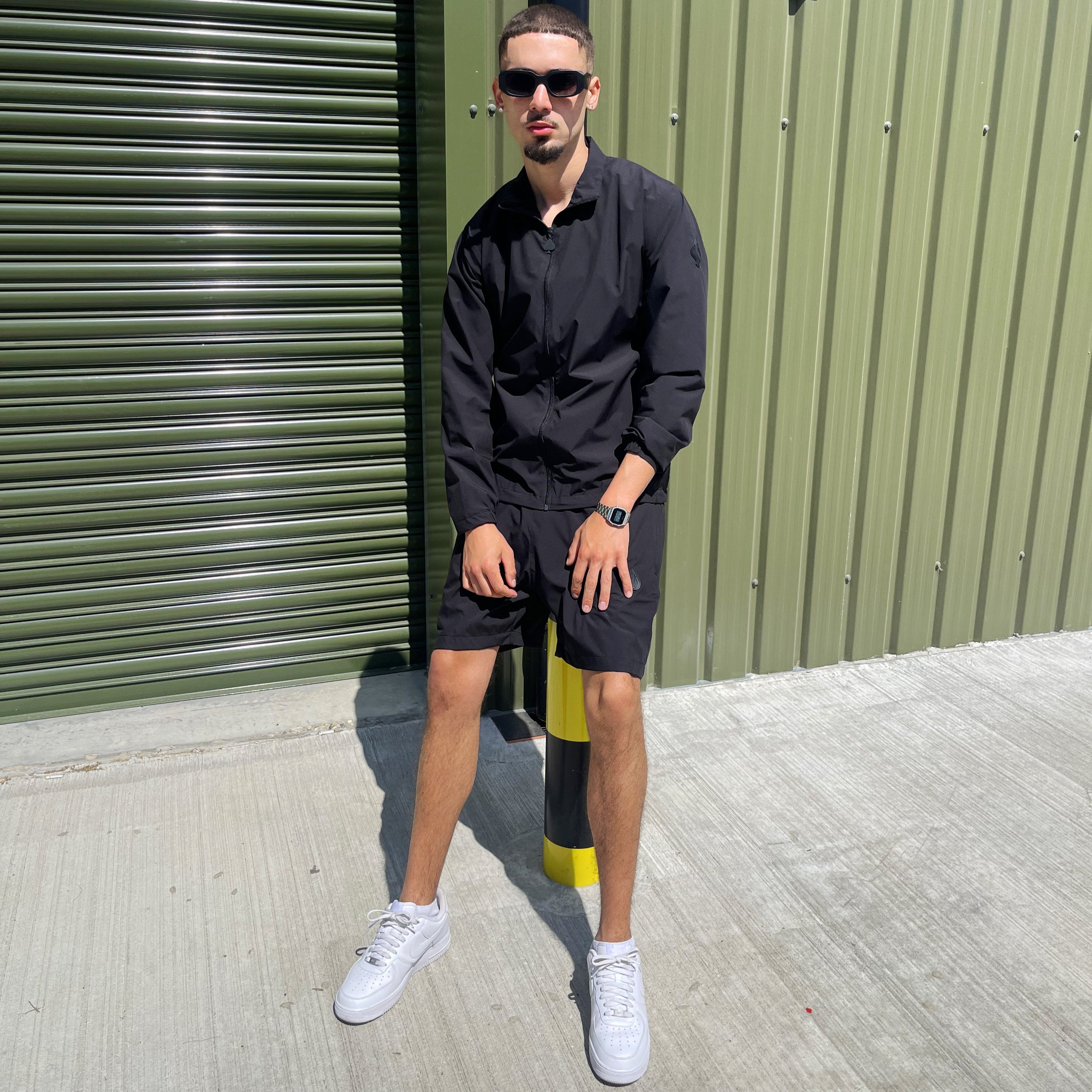 All-black 3-piece co-ord by Gabos London, featuring zip-up jacket, trousers and free shorts – designed for high-performance streetwear