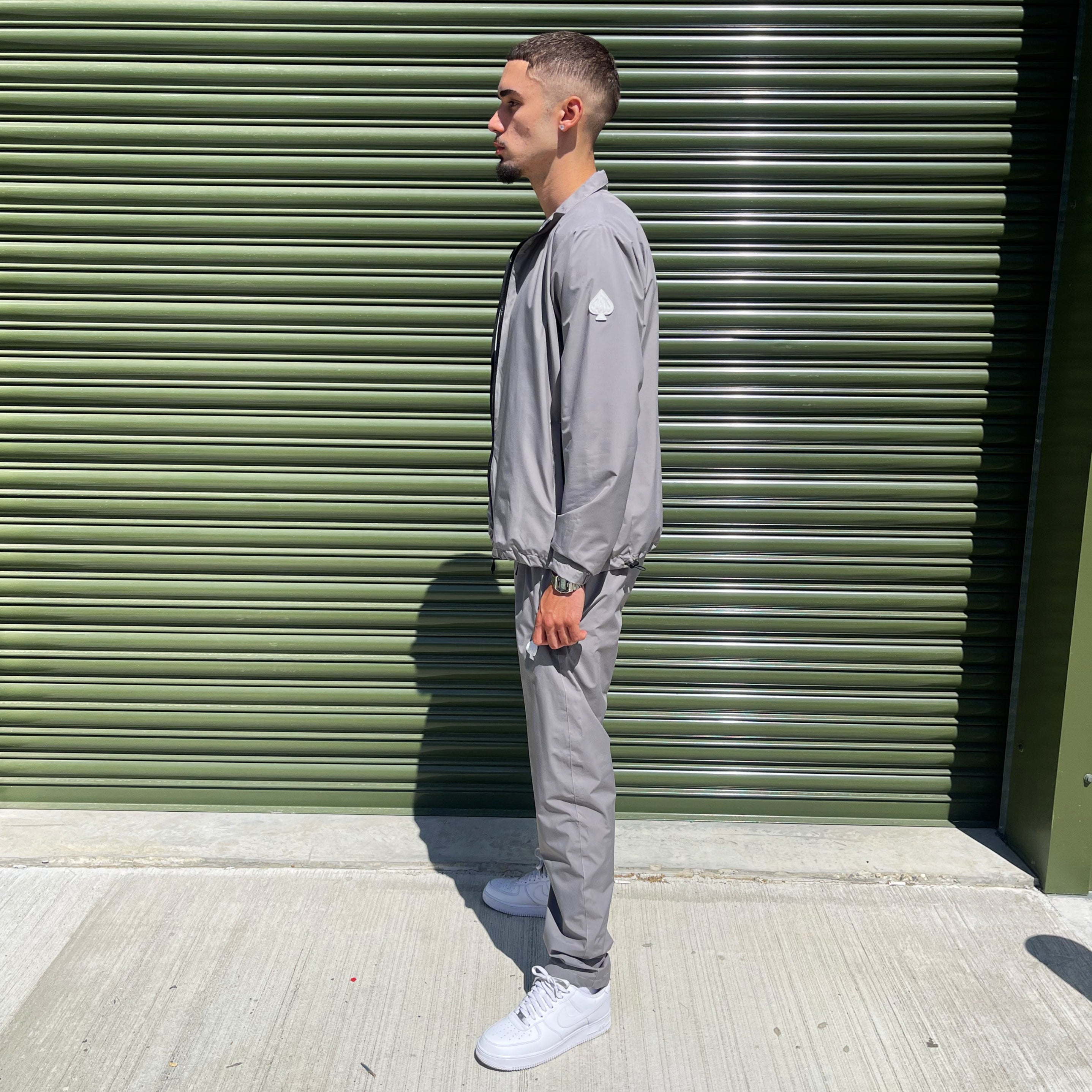 Menswear look: Gabos London 3-piece grey tracksuit set styled with white Air Force 1s, combining comfort and street credibility