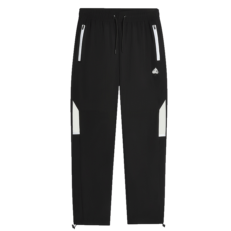 Black athletic pants with white reflective-looking side zipper details, white side panel accents on the legs, and a small white logo on the left thigh, shown against a plain white background.