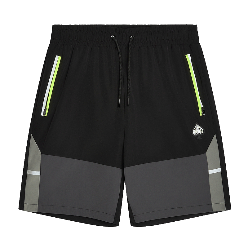 Black athletic shorts with gray color-blocked panels at the lower legs, reflective neon green and white side stripe details, a black drawstring waist, and a small white logo on the left thigh.