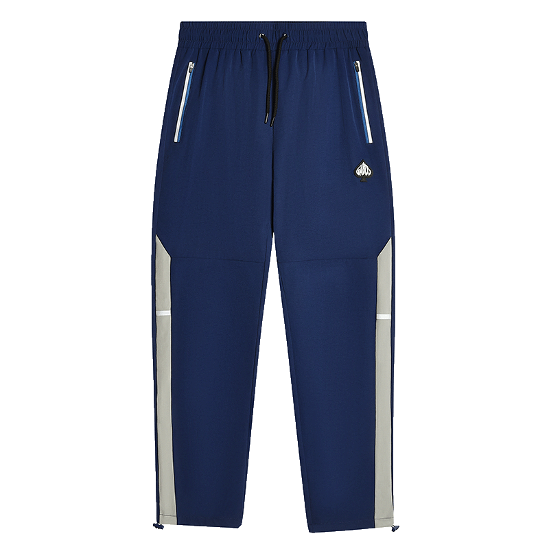 A pair of navy blue athletic pants with light gray side panels and white zipper accents on the side pockets, shown against a plain white background.