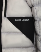 puffer jacket pocket. Gabos london reflective text print