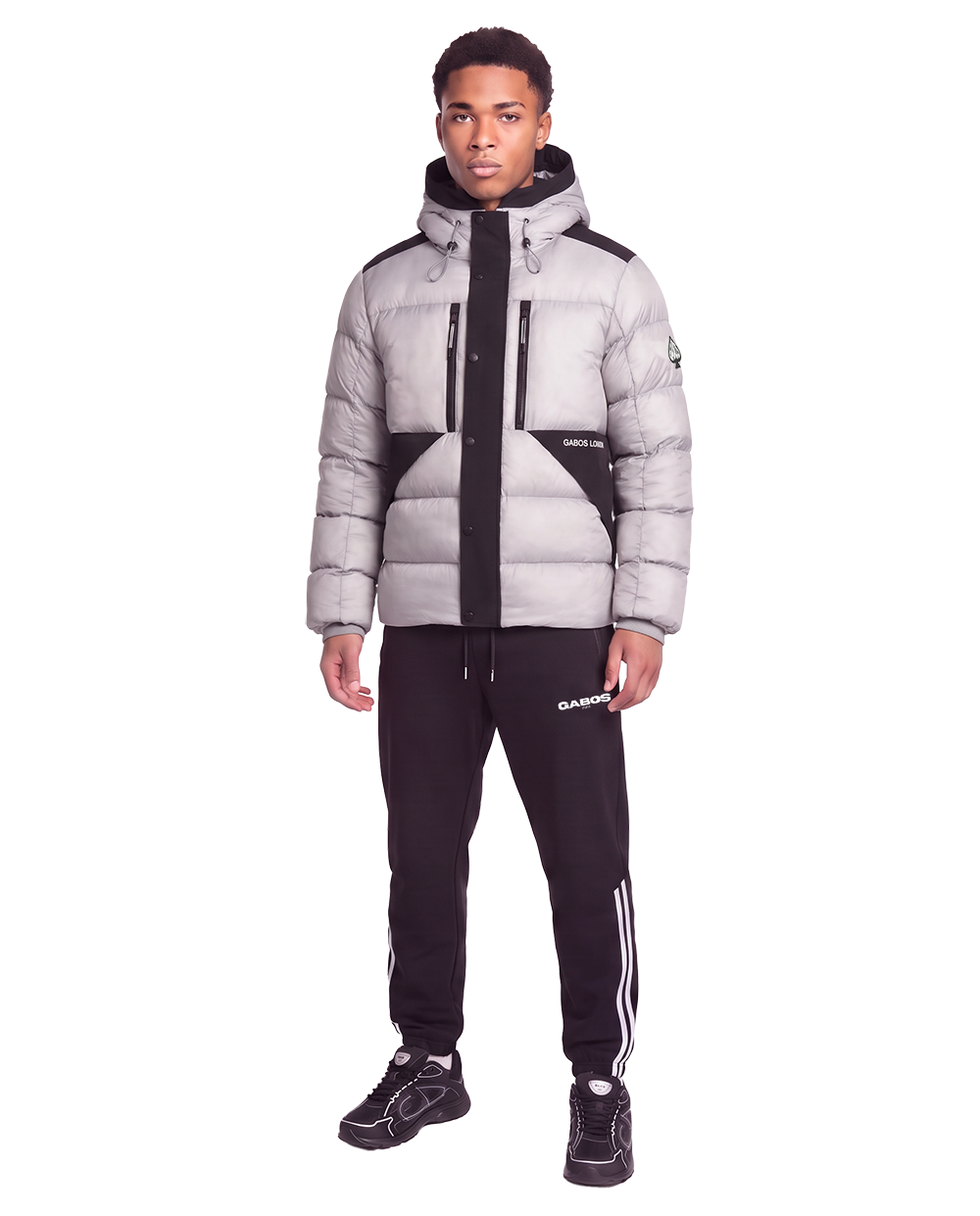 man seen in a grey and black winter puffer jacket by Gabos London